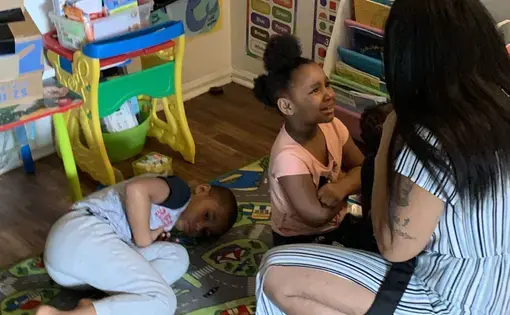 Tyra Johnson struggled to get her young children through the first day of school at home. Image by Aisha Sultan / Post-Dispatch. United States, 2020.