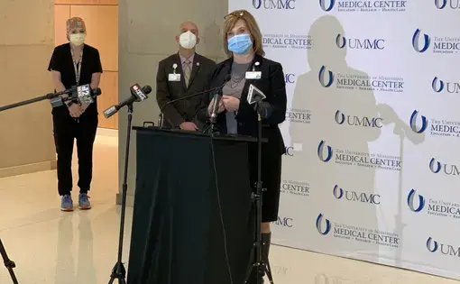During a news conference Monday, Nov. 23, 2020,&nbsp;Dr. LouAnn Woodward (at podium), vice chancellor for health affairs and dean of the School of Medicine at the University of Mississippi Medical Center, calls for the statewide mask mandate to be resumed. Image courtesy of UMMC. United States, 2020.