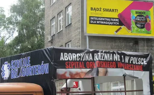 A defaced truck bearing anti-abortion messages outside one of the last hospitals in Poland that still performs abortions. Image by Alex Cocotas. Poland, 2016.