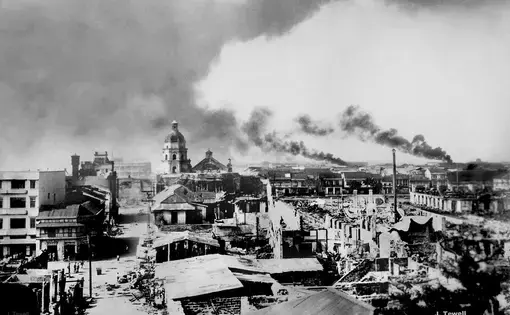 Manila burning in February, 1945, during the World War II Battle of Manila. Image courtesy of J. Tewell / Creative Commons. Philippines, 1945.