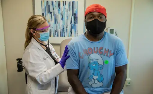 This man in Ohio was among the tens of thousands who received Moderna's experimental COVID-19 vaccine in a recent trial that demonstrated 94.1% efficacy. Image courtesy of&nbsp;University of Cincinnati Health. United States, 2020.