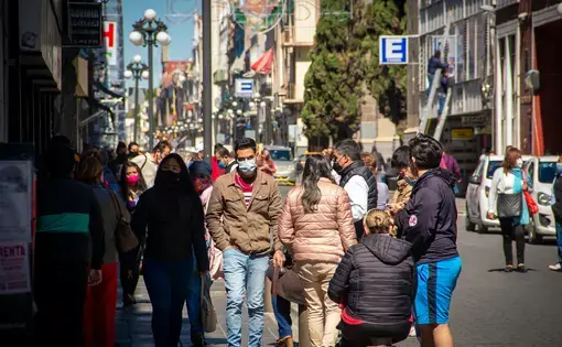 Residents of Puebla, Mexico, take to the streets and resume activities after seven months of quarantine due to the COVID-19 pandemic. Image by Alejandro_Munoz / Shutterstock. Mexico, 2020.