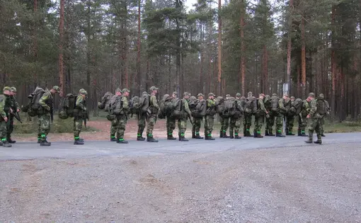 Swedish recruits prepare to step off on a hike. Image by Teresa Fazio. Sweden, 2018.