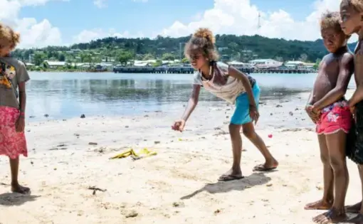 Children playing in Malaita, where sea levels are rising. Image by Monique Jaques. Papua New Guinea, 2019.
