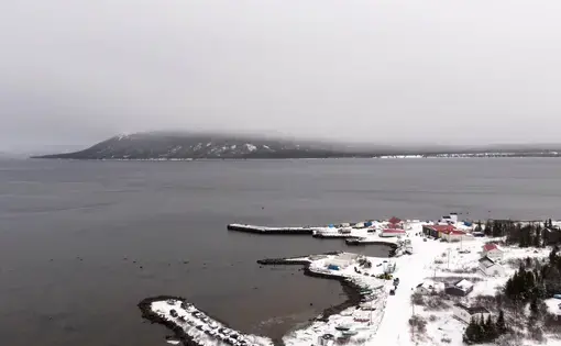The town of Rigolet reaches out into the waters of Lake Melville on the coast of Labrador on November 14, 2019. Image by Michael G. Seamans. Canada, 2019.