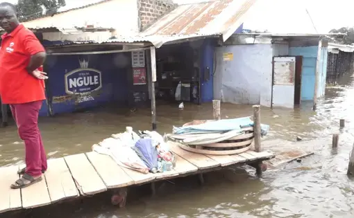 Flooded Ggaba market in Luzira, Kampala after Lake Victoria burst its banks. Image by Noah Omuya. Uganda, 2020.