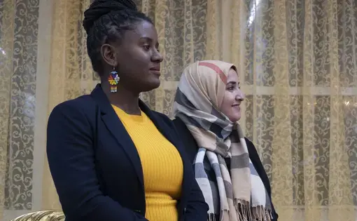 Genesis Aquino and Somia Elrowmeim at Aquino's campaign launch party. Image by Hana Elias. United States, 2019.