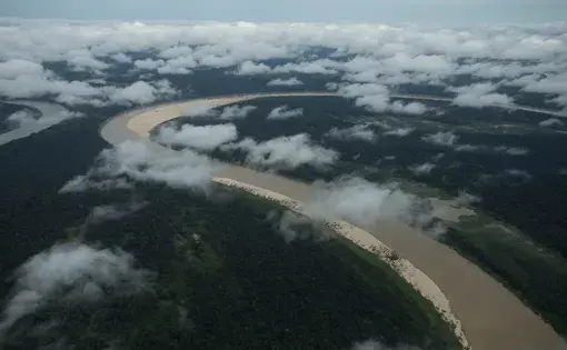 The winding Juruá River and the Middle Juruá Extractive Reserve, seen from an airplane, Amazonas, Brazil, October 19, 2019. Image by Bruno Kelly/Thomson Reuters Foundation. Brazil, 2019.