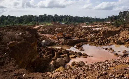 In easily accessible settlements like Brownsweg, a small Maroon village in Suriname's interior, a majority of the population is involved in mining. Image by Bram Ebus. Suriname, 2020.
