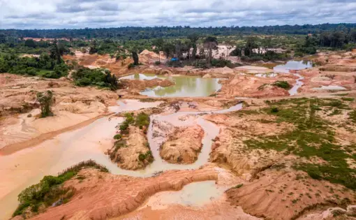 An aerial view of a deforested area of the Amazon rainforest caused by illegal mining activities in Brazil. Image courtesy of Shutterstock. Brazil, date unknown.