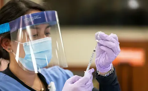 The Protect Chicago Plus plan allows anyone in that community to get a COVID-19 vaccine, and the first efforts resulted in 1,500 people vaccinated in Belmont Cragin in one weekend. Manuel Martinez / WBEZ