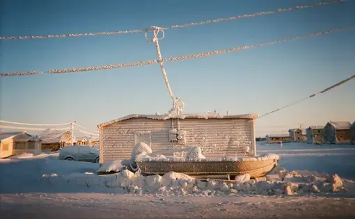 A local home in Utqiagvik, covered in frost and snow