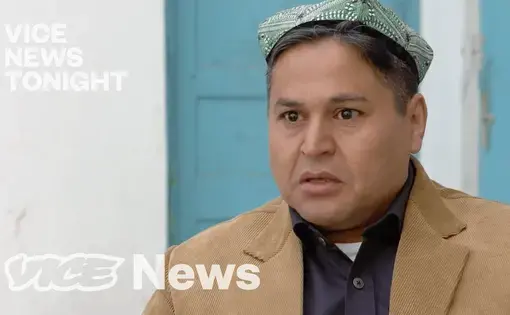 A man speaks, white text "Vice News Tonight" and Vice News logo on left side