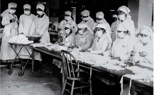 Image of 10 Red Cross volunteers with gauze badges during the 1918 Great Influenza pandmic