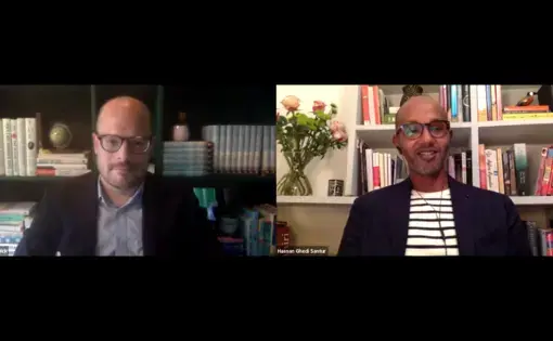 Ty McCormick and Hassan Ghedi Santur speak on Zoom.