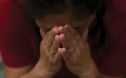 Portrait of Paty crying.