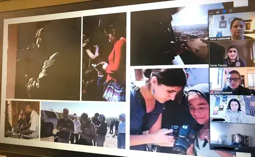 A journalist presents photos of herself in the field to a group of high school students via Zoom.
