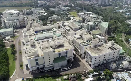 The 20-hectare original campus of the Serum Institute of India (above) now abuts its equally large biotech park, which has vastly expanded the company’s vaccine production capabilities.