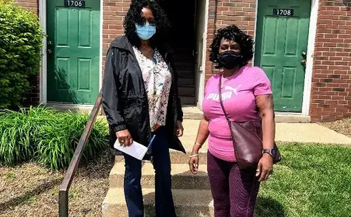 Journalist Denise Hollinshed standing with Beverly Jones for the 63106 Project..