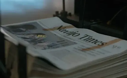 A stack of copies of the Navajo Times newspaper