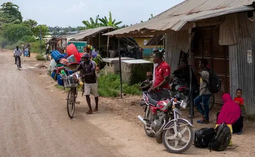 People standing on a road in Tanzania