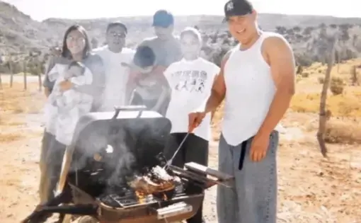 Photo of Yazzie family grilling