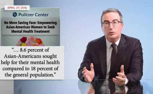 On the left is John Oliver sitting in front of a blue background and wearing a suit and tie. On the right is an excerpt of the Pulitzer Center story "No More Saving Face: Empowering Asian-American Women to Seek Mental Health Treatment" that reads, "...8.6 percent of Asian-Americans sought help for their mental health compared to 18 percent of the general population."