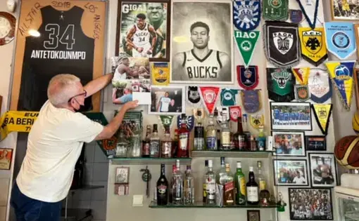 Man standing with posters