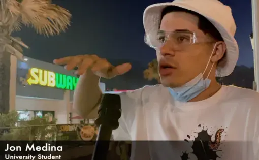 A university student in Puerto Rico speaks during a video interview.