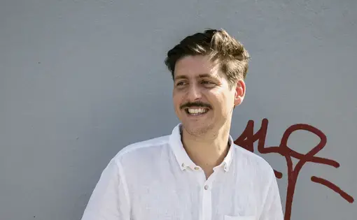 photo of man in a white button up