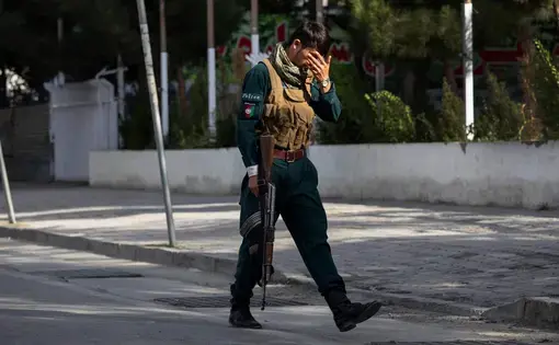 solider walks with head down