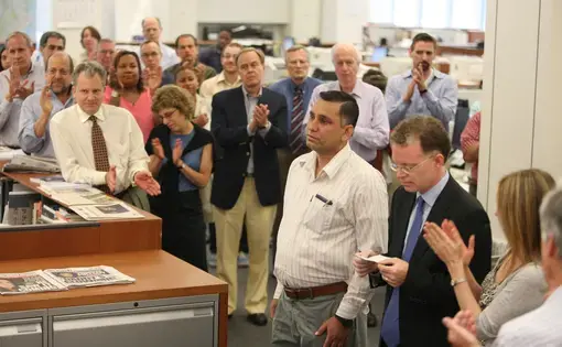 Tahir Luddin and David Rohde at the office of the New York Times, for which Rohde reported, after escaping the Taliban.Photograph by James Estrin / NYT / Redux