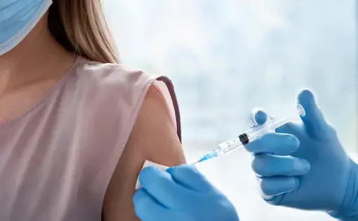 Someone getting the vaccine,