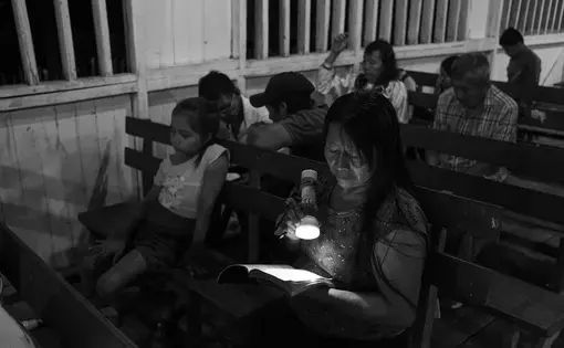 Women sit at church