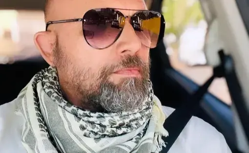 Rogério Florentino Pereira wearing sunglasses