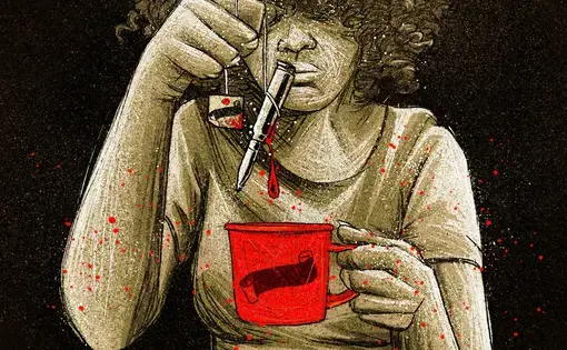 A woman holds a bullet over a red cup of coffee.
