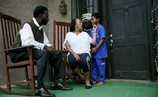 the Buxtons sit on porch