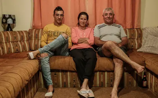 Family poses for photo