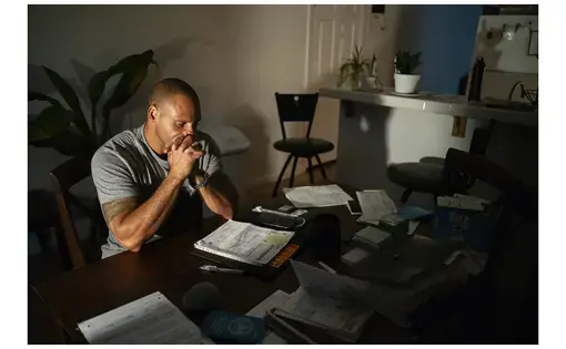 Man sits at desk