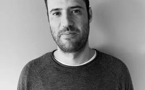 A man wearing a sweatshirt.
