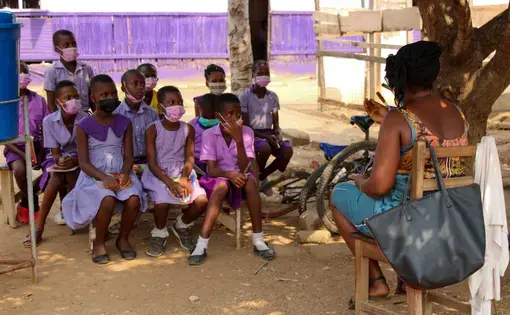 children attend class outside