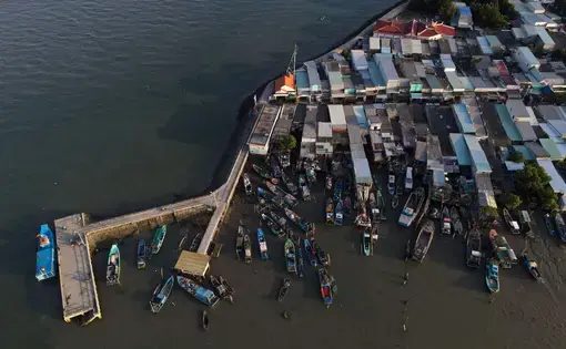 An aerial overview of fishing boats and its docks in Vietnam.