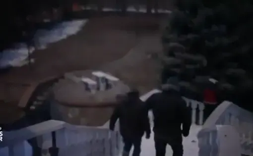 Men walking down steps
