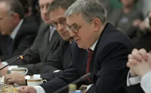 man sits