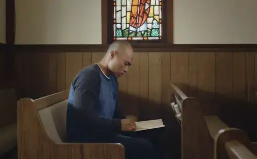 Man sitting in pew