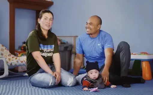 Gary sits with family