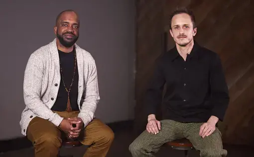 video thumbnail, two men sit for an interview