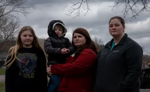 family posing for portrait