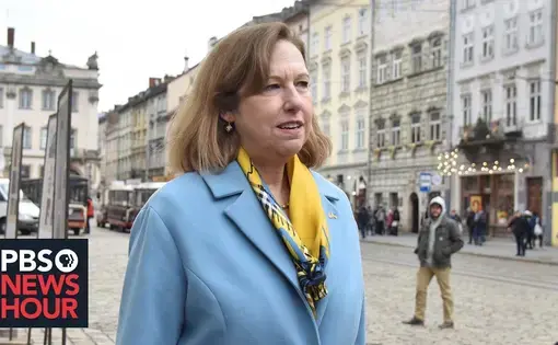 U.S. acting ambassador to Ukraine Kristina Kvien speaks on a street in Kiev
