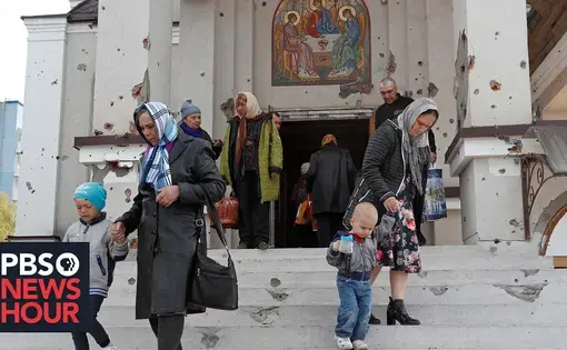Ukrainians leave a church